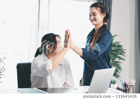 Business meeting, data analytics or women with graph presentation in office. Chart, analysis accounting team brainstorming economy, inflation or solution. business project finance investment concept. 133645426