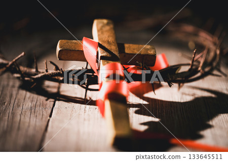 Closeup of Jesus Christ wearing crown of thorns during His crucifixion captures the suffering, sacrifice, and deep spirituality that define Easter and the core of Christian faith and religion. 133645511