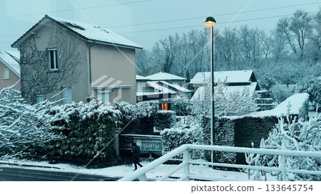 Snowy morning in a quiet residential neighborhood near Grenoble, France Snowy morning in a quiet residential neighborhood near Grenoble, France 133645754