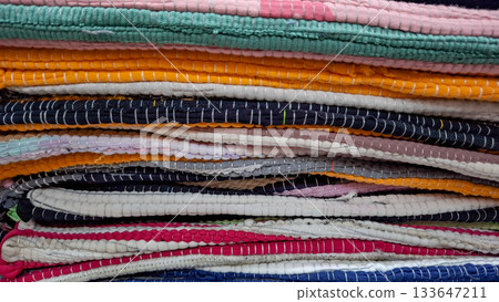 Full-frame shot of multiple rows of identical, clear plastic storage containers Full-frame shot of multiple rows of identical, clear plastic storage containers 133647211