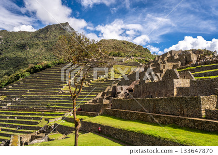 Panoramic view of Machu Picchu ruins with Huayna Picchu in background, Peru Panoramic view of Machu Picchu ruins with Huayna Picchu in background, Peru 133647870