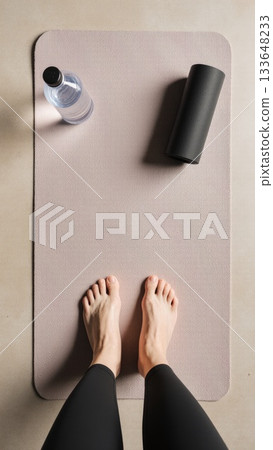 Post Workout Recovery Flat Lay with Bare Feet on Mat Post Workout Recovery Flat Lay with Bare Feet on Mat 133648233