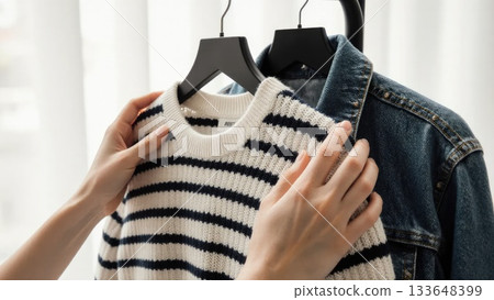 Macro Close-Up of Discount Tags and Fabric Textures on Clothing Hangers 133648399