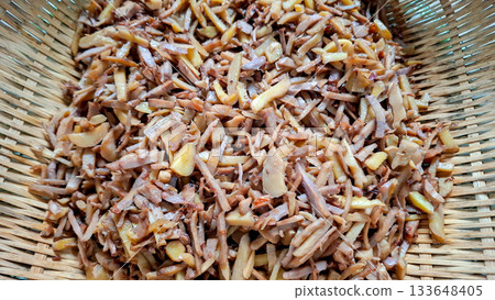 Shredded Sauted Banana Blossom in Woven Bamboo Basket Shredded Sauted Banana Blossom in Woven Bamboo Basket 133648405