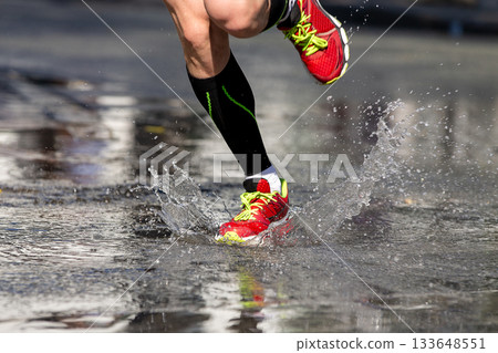 Runner feet in compression socks 133648551