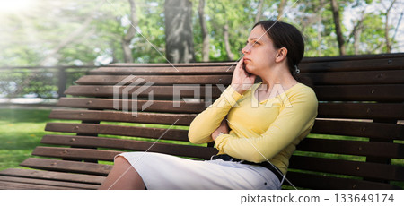 Sad girl praying to God 133649174