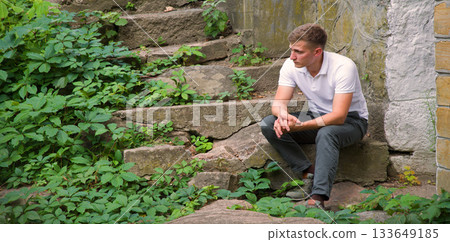 Sad man in the park Sad man in the park 133649185