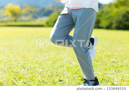 The feet of a middle-aged woman running outdoors The feet of a middle-aged woman running outdoors 133649310