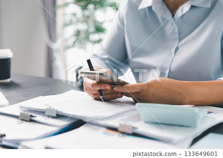 Business person with contract law and paper work for business finance, loan application form, contract real estate and insurance concept. signing contract, working on desk, business document 133649601