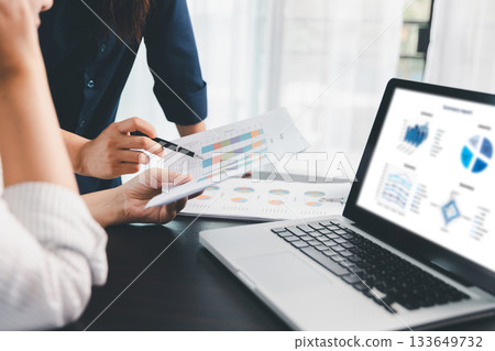 Business meeting, data analytics or women with graph presentation in office. Chart, analysis accounting team brainstorming economy, inflation or solution. business project finance investment concept. 133649732