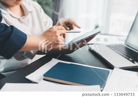 Business meeting, data analytics or women with graph presentation in office. Chart, analysis accounting team brainstorming economy, inflation or solution. business project finance investment concept. 133649733