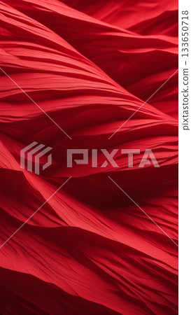 Abstract red fabric waves with soft folds and textures, elegant textile vertical background perfect for design, fashion, or festive themes. 133650718