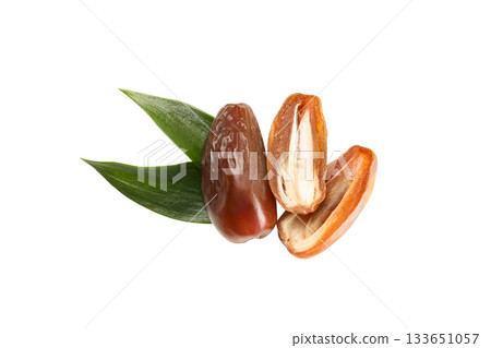 Fresh leaf-wrapped dates for healthy Ramadan, isolated, PNG Fresh leaf-wrapped dates for healthy Ramadan, isolated, PNG 133651057