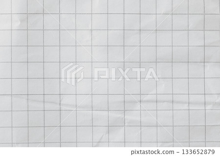Crumpled grid notebook paper texture, macro close-up. Suitable as a background or design element for creative and graphic projects Crumpled grid notebook paper texture, macro close-up. Suitable as a background or design element for creative and graphic projects 133652879