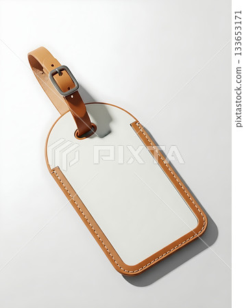 Elegant leather luggage tag with a blank white space for personalization Elegant leather luggage tag with a blank white space for personalization 133653171
