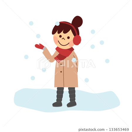 Woman standing in the snow 133653469