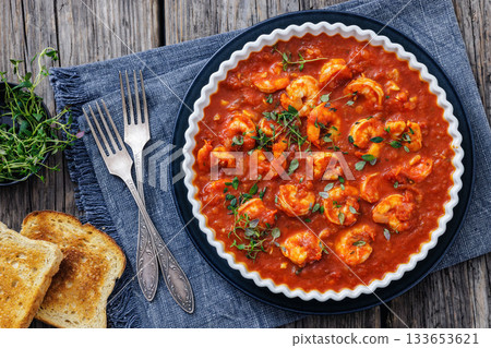 Shrimp in hot tomato sauce with garlic, onion 133653621