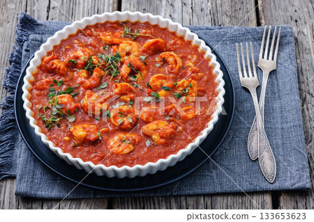 Shrimp in hot tomato sauce with garlic, onion 133653623