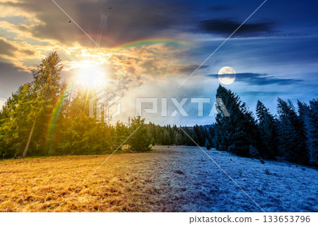 wonderful countryside landscape in spring. day and night time change concept. row of spruce trees on a hill with sun and moon. meadow in weathered grass. cloudy sky. harmony and progress calendar wonderful countryside landscape in spring. day and night time change concept. row of spruce trees on a hill with sun and moon. meadow in weathered grass. cloudy sky. harmony and progress calendar 133653796
