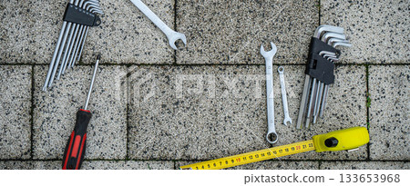 Greeting card of Fathers day. Flat set tools on stone pavement background Greeting card of Fathers day. Flat set tools on stone pavement background 133653968