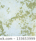 Peeling painted concrete wall, cracks of green blue and beige, peeling paint of the old rough concrete wall, peeling paint texture 133653999