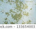 Peeling painted concrete wall, cracks of green blue and beige, peeling paint of the old rough concrete wall, peeling paint texture 133654003