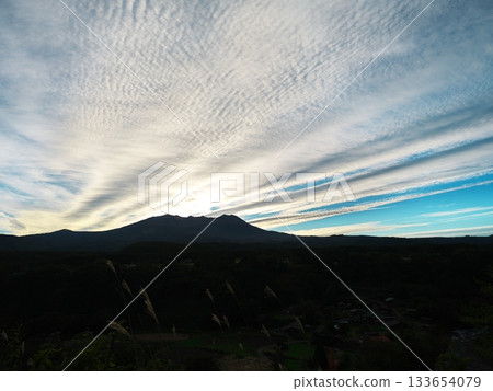 Mount Mitake, bathed in sunset clouds, seen from Yanagimata Viewpoint Mount Mitake, bathed in sunset clouds, seen from Yanagimata Viewpoint 133654079