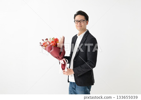 man holding a bouquet man holding a bouquet 133655039