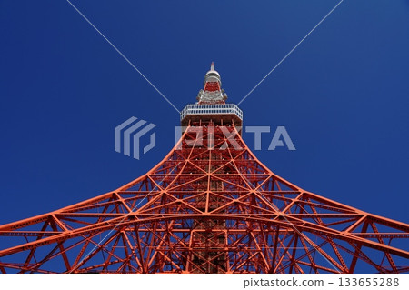 Tokyo Tower and the blue sky seen from below in the daytime. November, Minato Ward 2282. Tokyo Tower in the daytime. 133655288