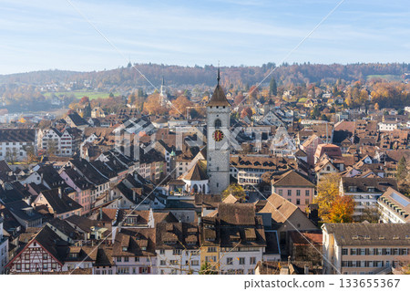 Panoramic view of St. John's Church and the old town of Schaffhausen in autumn with fog. Schaffhausen, Switzerland 133655367