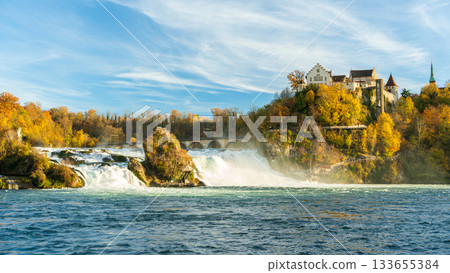 Autumn scenery of the Rhine Falls and Laufen Castle in Neuhausen, Schaffhausen, Switzerland Autumn scenery of the Rhine Falls and Laufen Castle in Neuhausen, Schaffhausen, Switzerland 133655384