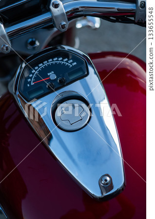 A close-up of a motorcycle's gas tank. A close-up of a motorcycle's gas tank. 133655548