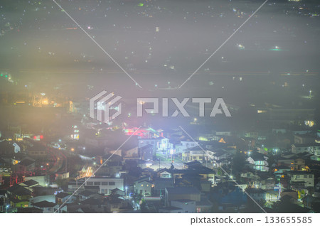 Cityscape shrouded in morning mist [Shimanai, Matsumoto City] 133655585