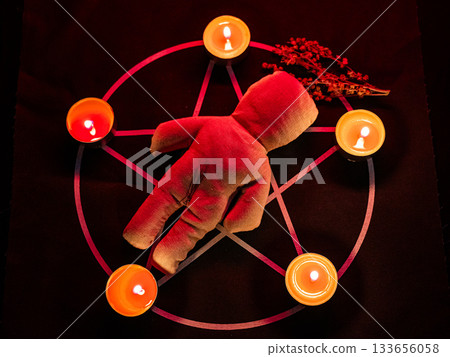 Voodoo doll on a pentagram. Witch spells. Voodoo doll on a pentagram. Witch spells. 133656058