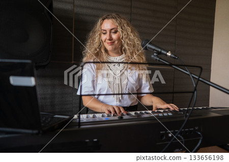 Caucasian woman teaches online music lesson.. Caucasian woman teaches online music lesson.. 133656198