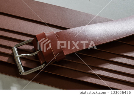 Close up of leather belts.  133656456