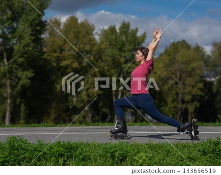 Caucasian woman roller skating in park. Caucasian woman roller skating in park. 133656519
