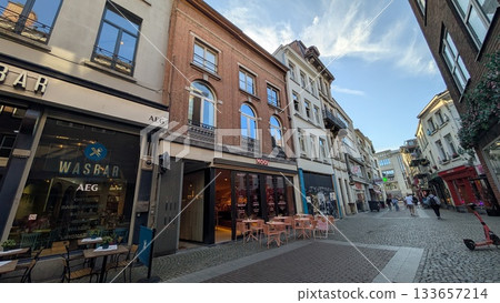 Touristic street with open cafes in Antwerp 133657214