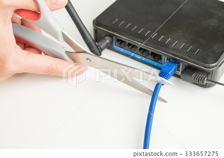 Scissors cut the router cables. Scissors cut the router cables. 133657275