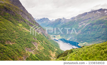 Fjord Geirangerfjord with ferry boat, Norway. Fjord Geirangerfjord with ferry boat, Norway. 133658910