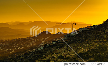 Sunset over spanish coastal hills landscape 133658935
