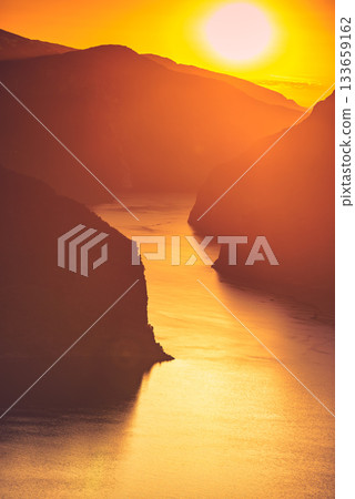 Fjord landscape at sunset, Norway 133659162