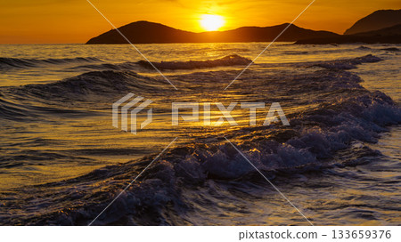 Sunset over sea, Calblanque beach, spain Sunset over sea, Calblanque beach, spain 133659376