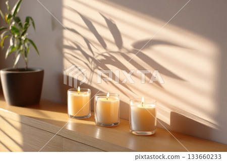 Evening prayer scene with gentle candlelight casting soft shadows on the wall, creating a serene atmosphere for reflection and meditation in a cozy setting 133660233
