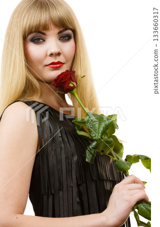 Woman gorgeous girl dark makeup holds rose flower Woman gorgeous girl dark makeup holds rose flower 133660317