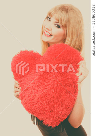Woman gorgeous girl holding red heart love symbol Woman gorgeous girl holding red heart love symbol 133660318