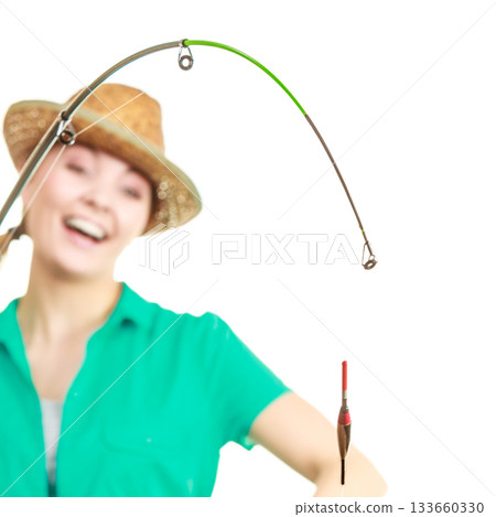 Woman with fishing rod, spinning equipment Woman with fishing rod, spinning equipment 133660330