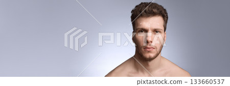 Male face marked on forehead and nose for contour planning. Banner 133660537