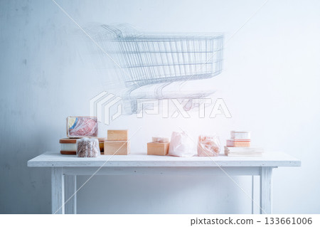 Minimal modern surreal composition with transparent shopping cart sketch above white table, various packaged food, cheese, and deli items, evoking fresh and creative grocery shopping concept 133661006