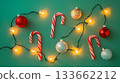 A green background with a string of lights 133662212